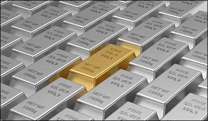 Close-up of a 20-dollar banknote and gold bullions